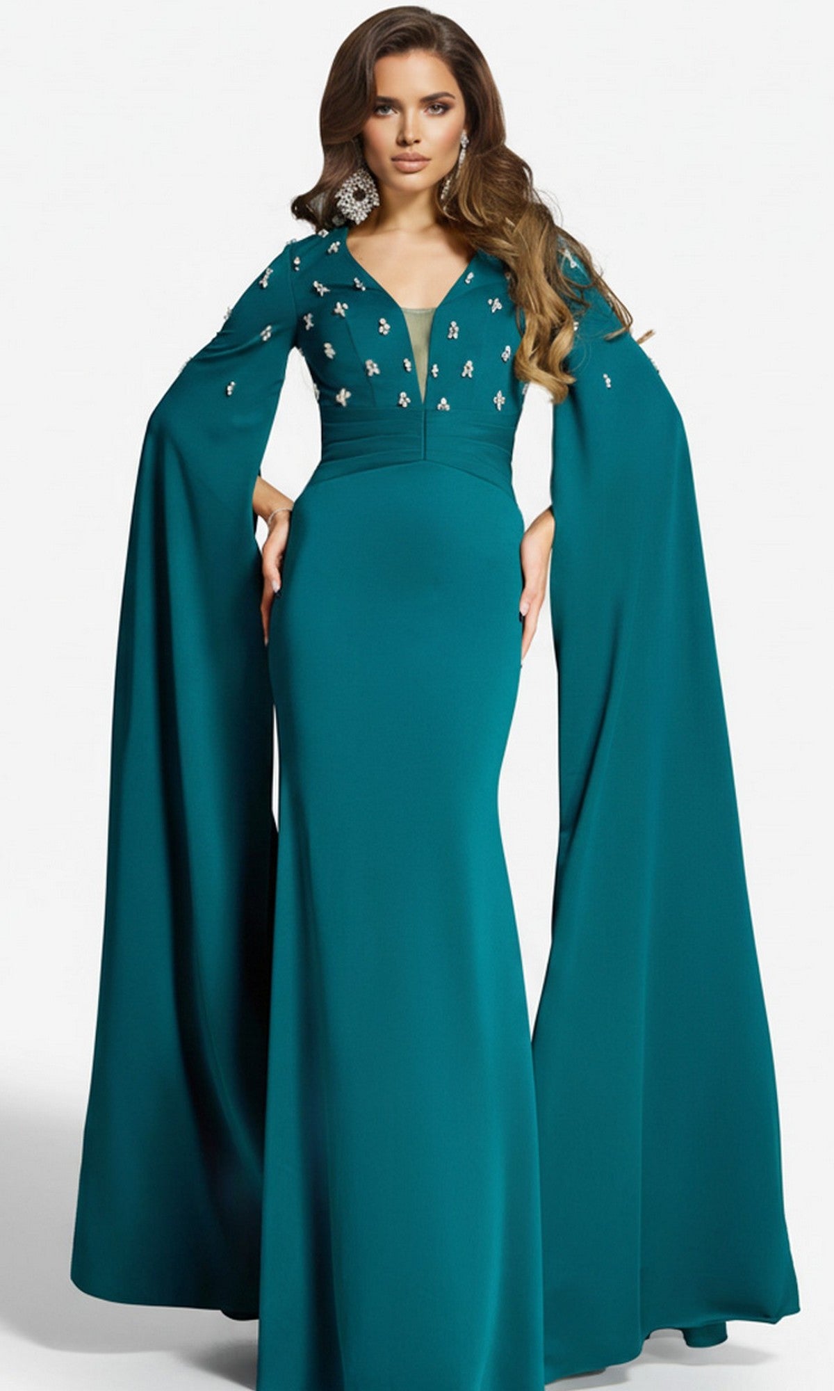 Dark green evening gown with cape-style sleeves on a white background